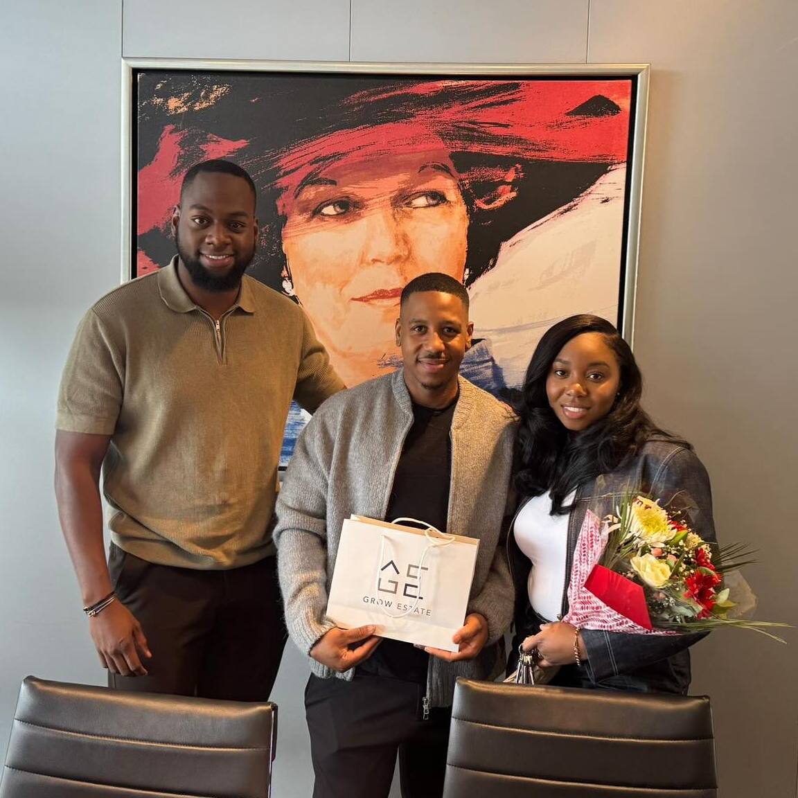 Denzel en Jaïro met tevreden klanten